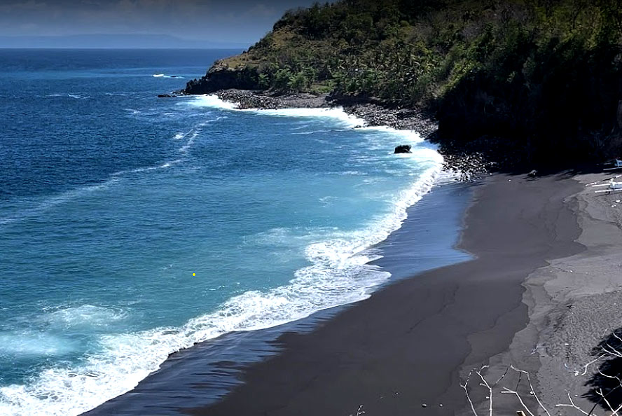 Black Sand Beach - one of the most remote beaches of Bali.
